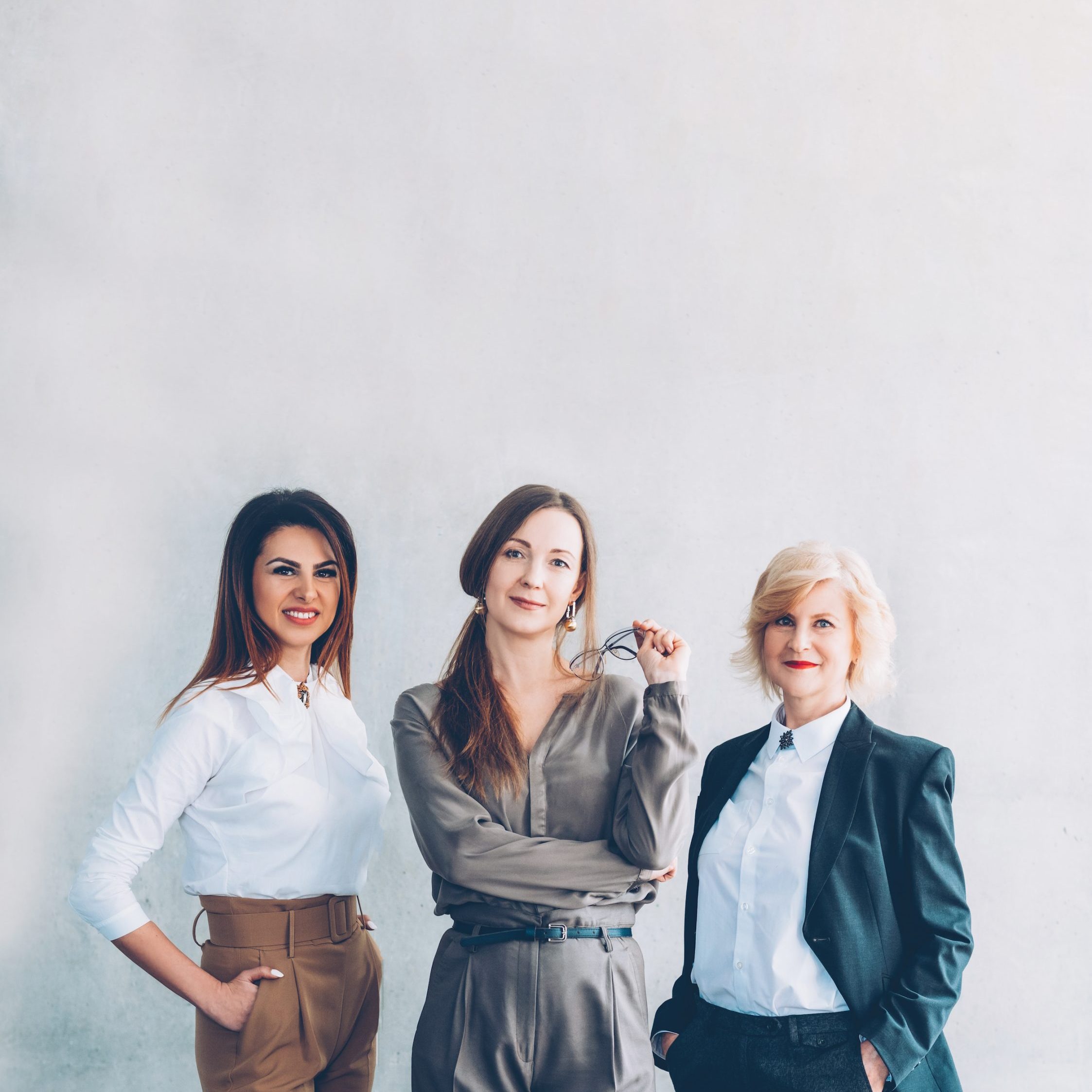 Female oriented company. Power strength intelligence. Three confident business women.