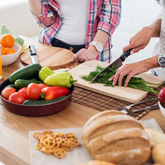 Gorgeous young Women preparing dinner in a kitchen concept cooking, culinary, healthy lifestyle